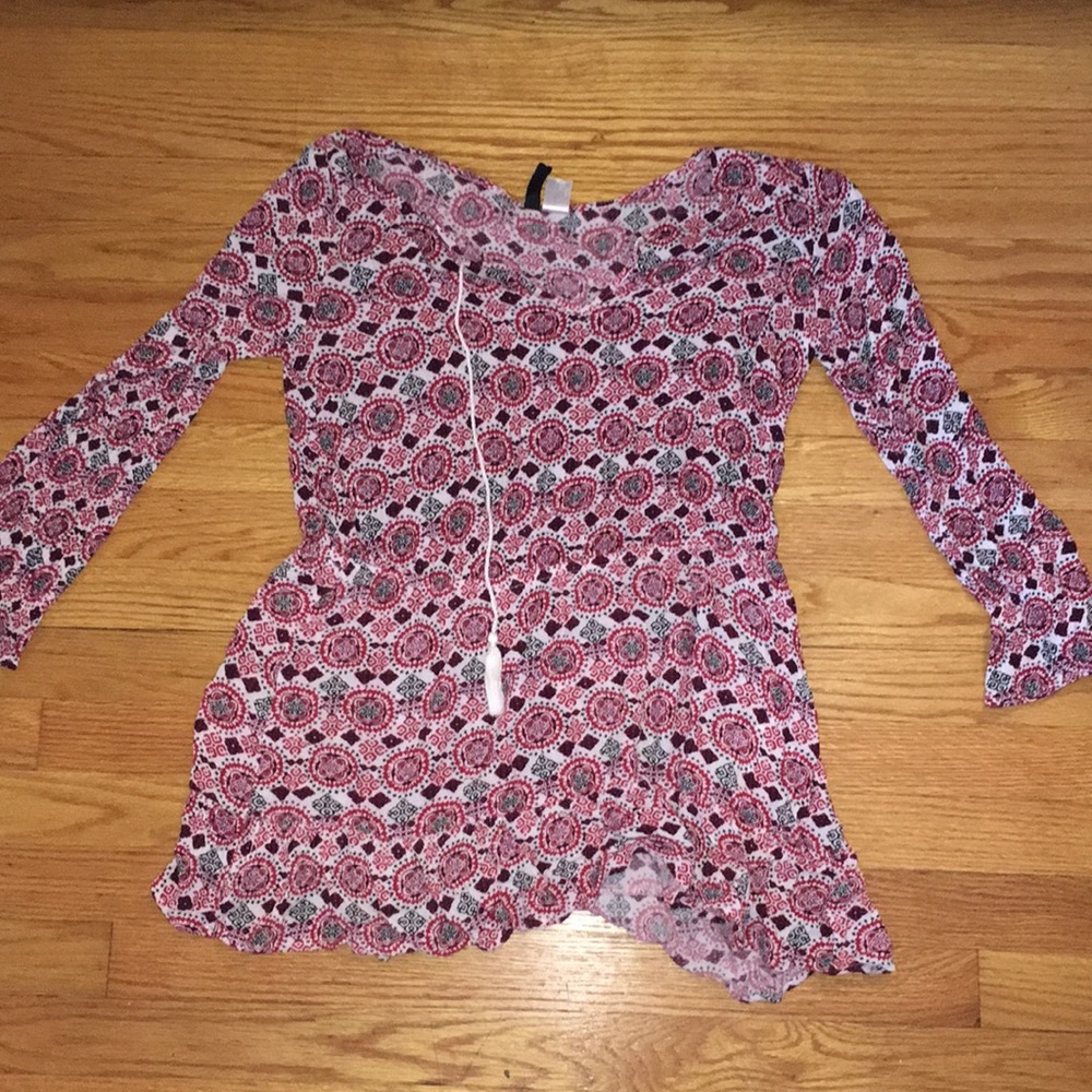 Cute either short dress, beach over up, or shirt